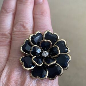 Gold plated black and gold flower bracelet.